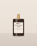 Brume Santal Ambré Vannucci, flacon vaporisateur sur fond clair